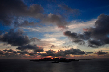 Sunset of the Island of Praslin from La Digue Island, Seychelles