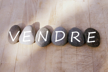vendre en mot sur galets ,concept 