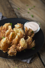 Blooming onion with yoghurt sauce