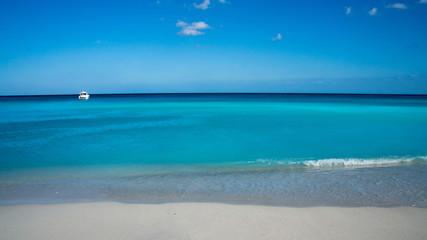 Yacht in the Caribbean Sea turquoise color. Cancun coast, Mexico.