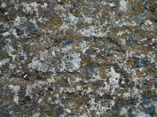 Grey wall made of concrete aggregate with small crumbs, close up view. Abstract background. Marble aggregate texture close up. Marble wall pattern