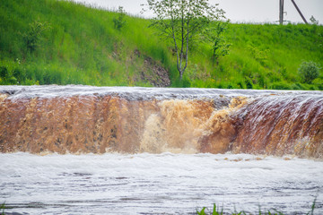 Sablinsky waterfalls. Little waterfall. The brown water of the waterfall.. Thresholds on the river....