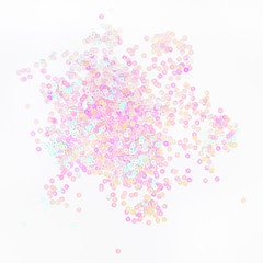 Pearl pastel confetti sparkles on white background