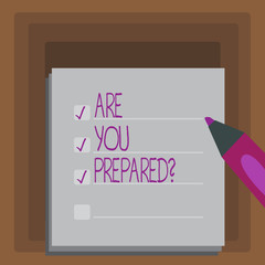 Writing note showing Are You Preparedquestion. Business concept for Ready Preparedness Readiness Assessment Evaluation
