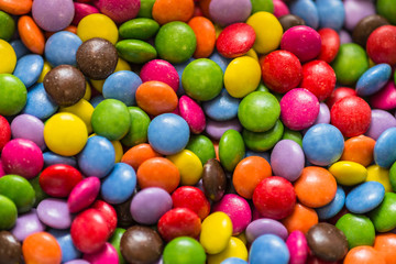 Fototapeta na wymiar Many colorful sweets. Beautiful colored sweets.