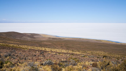 Fototapeta premium Aerial panoramic view of the Salar de Uyuni from the Tunupa volcano. Bolivia.