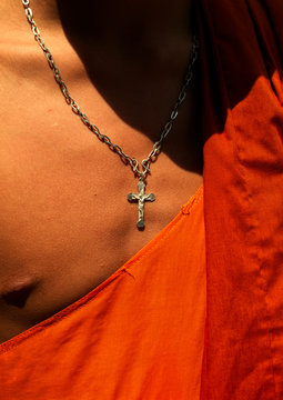 Monk With A Christina Cross Around His Neck, Menglun, Yunnan Province, China