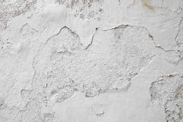 The grunge white concrete old texture wall