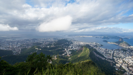 Panoramic view of Rio de Janeiro landscape under rain clouds in Brazil.