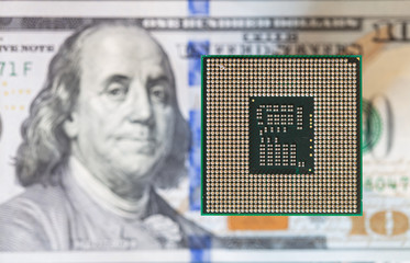 CPU (Central Processing Unit) or Microchip Computer on dollar background