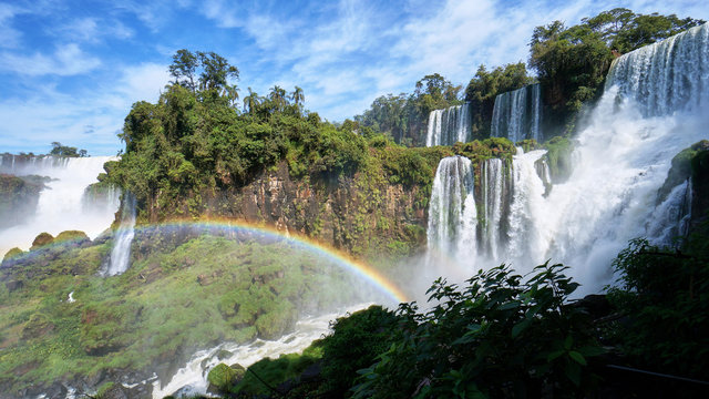 Iguazu Waterfalls and a round rainbow. Located between Argentina and Brazil. 