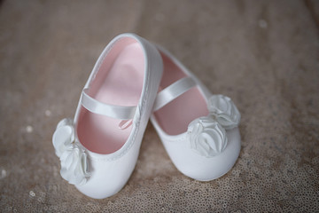 Elegant white ballerina shoes for little girls or baby girl booties with white chiffon flowers and elasticated support strap, adorable footwear reserved for Christening, weddings or special occasions