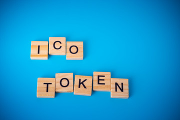 ICO on wood.