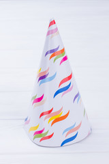 Festive paper hat for kids Birthday party. Cardboard party hat with beautiful design. DIY crafts for children.
