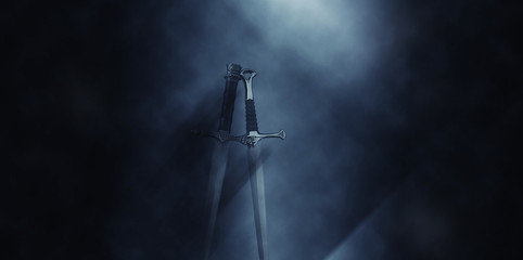 mysterious and magical photo of silver sword over gothic black background with smoke. Medieval...