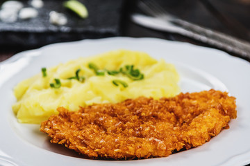 Chicken steak or schnitzel with mashed potatoes