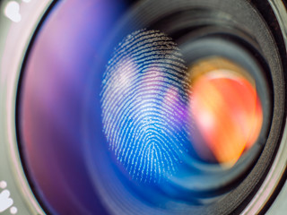 Fingerprint macro on a lens in natural light