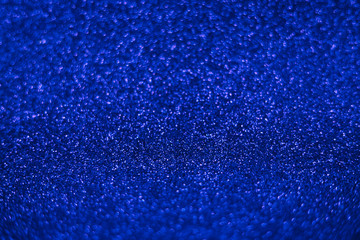 Fototapeta na wymiar Bright sparkle blue background. Holiday and festive concept.