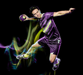 one caucasian handball player young man isolated on black background with speed light painting effect motion blur © snaptitude