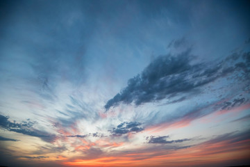 Dramatic sunset and sunrise sky with pink clouds