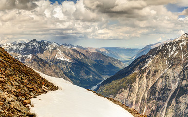 Panoramic view of snowy mountains.