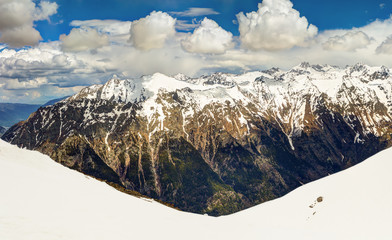 Panoramic view of snowy mountains.