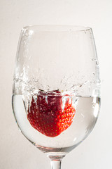 Strawberry in Waterglass with Splash