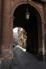 Fototapeta na wymiar Tenements and a stone street in Italy.
