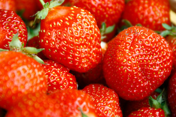 Background of red ripe strawberries. Summer ripe berries, closeup.