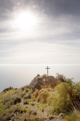cross on hill side