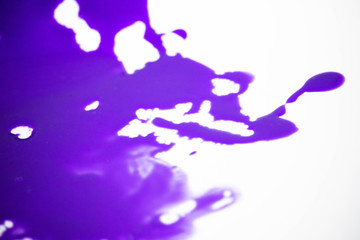 abstract messy purple violet lilac paint spill texture illustration in white background isolated photo close up