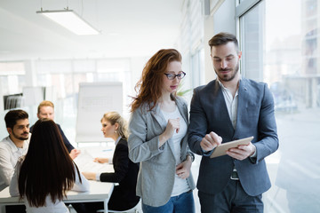 Business colleagues collaborating and discussing project plans