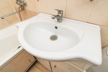 The photo of a sink in a bathroom