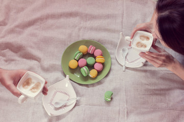 breakfast together in bed with macaroons