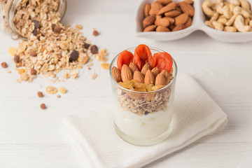 Homemade yogurt with granola, dried fruit and nuts bio with most healthy seed.
