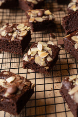 A lot of homemade Chocolate Brownies Placed on the black steel grill