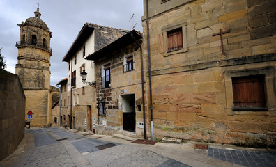 Labastida, Alava (Basque Country)/Spain; 06-29-2019: street of the medial or old helmet, paved floor and church is that of Our Lady of the Assumption
