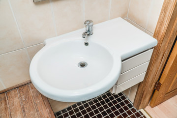 The photo of a sink in a bathroom