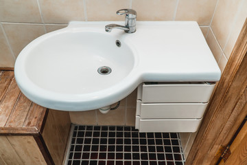 The photo of a sink in a bathroom