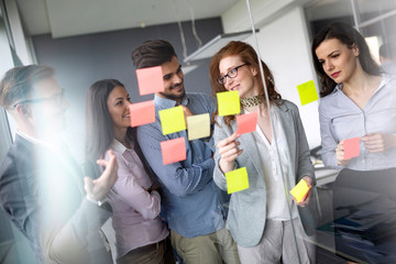 Creative business people working on business project in office