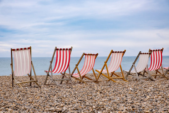 Deckchairs on beach at english seaside