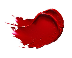 Red lipstick or acrylic paint isolated on white
