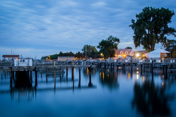 Fototapeta na wymiar wooden dock marina at sunset