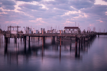 Fototapeta premium old wooden pier at sunrise