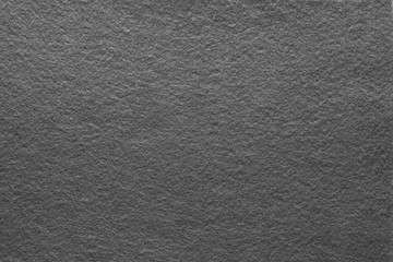 Asphalt gray felt texture abstract art background. Solid color material with grain surface. Empty...