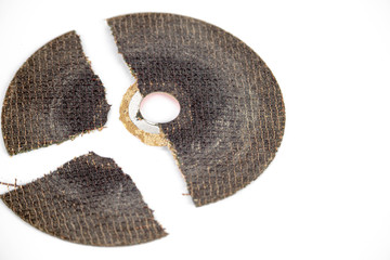 dangerous broken cracked cutting wheels abrasive safety work disc isolated white background photo close up