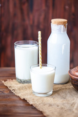 Homemade kefir, yogurt with probiotics in a glass on table Probiotic cold fermented dairy drink Trendy food and drink Copy space Rustic style.