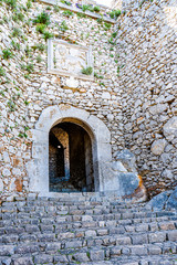 An entrance in the stone wall