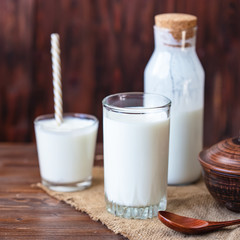 Homemade kefir, yogurt with probiotics in a glass on table Probiotic cold fermented dairy drink Trendy food and drink Copy space Rustic style.