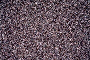 Abstract background of granite chips. Photo wall of the facade of the building.